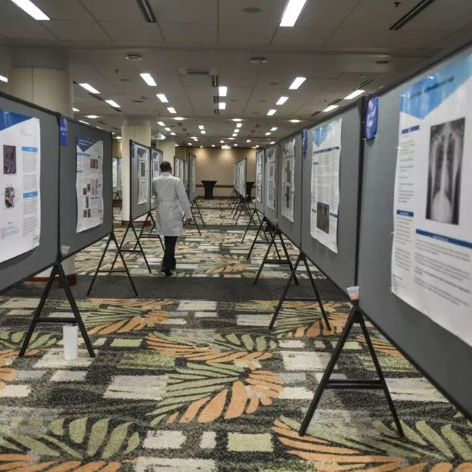 An aisle of research presentations 