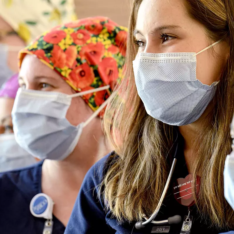 A group of nurses wearing face masks.