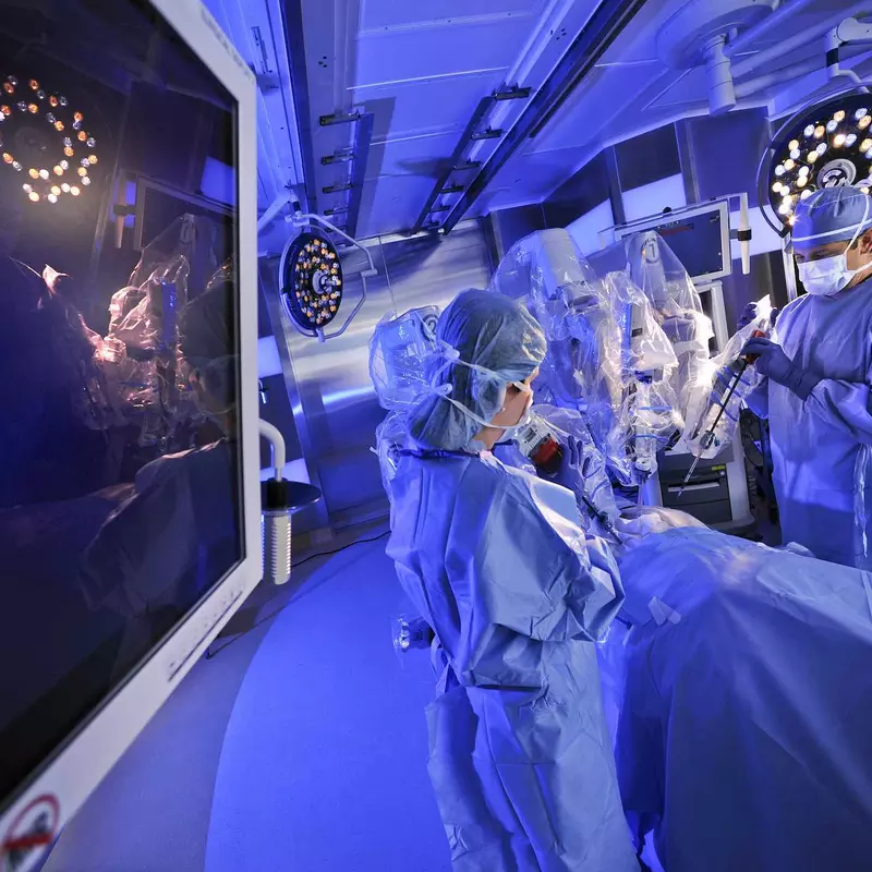 A physician and his staff are scrubbed-in in an operating room, preparing to perform a high-tech procedure at AdventHealth.