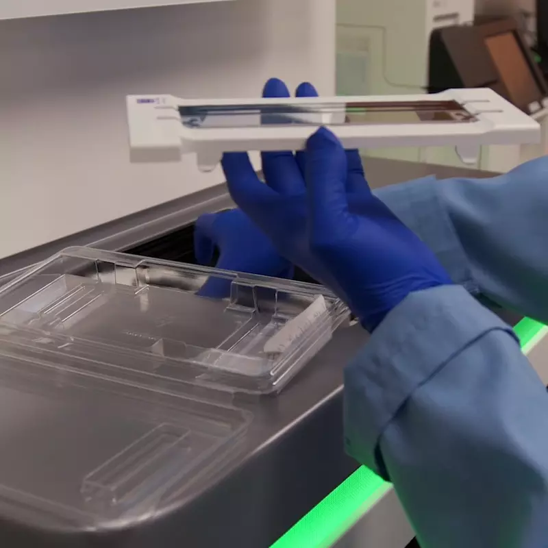 Technician uses matching-for-gene-sequencing