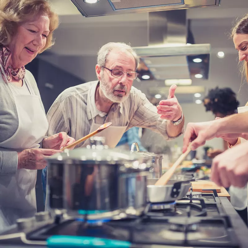 A group attends a cooking class.