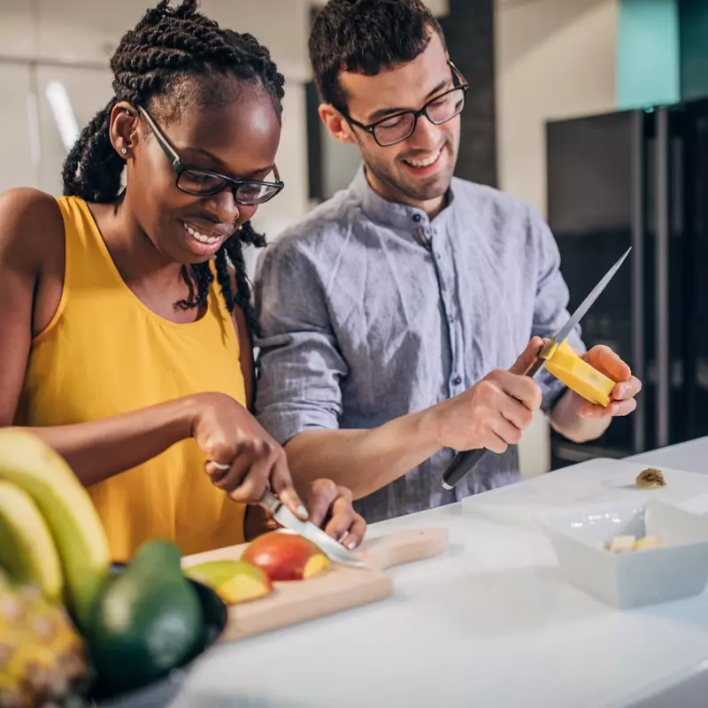 two adults prepare a health supper for diabetes