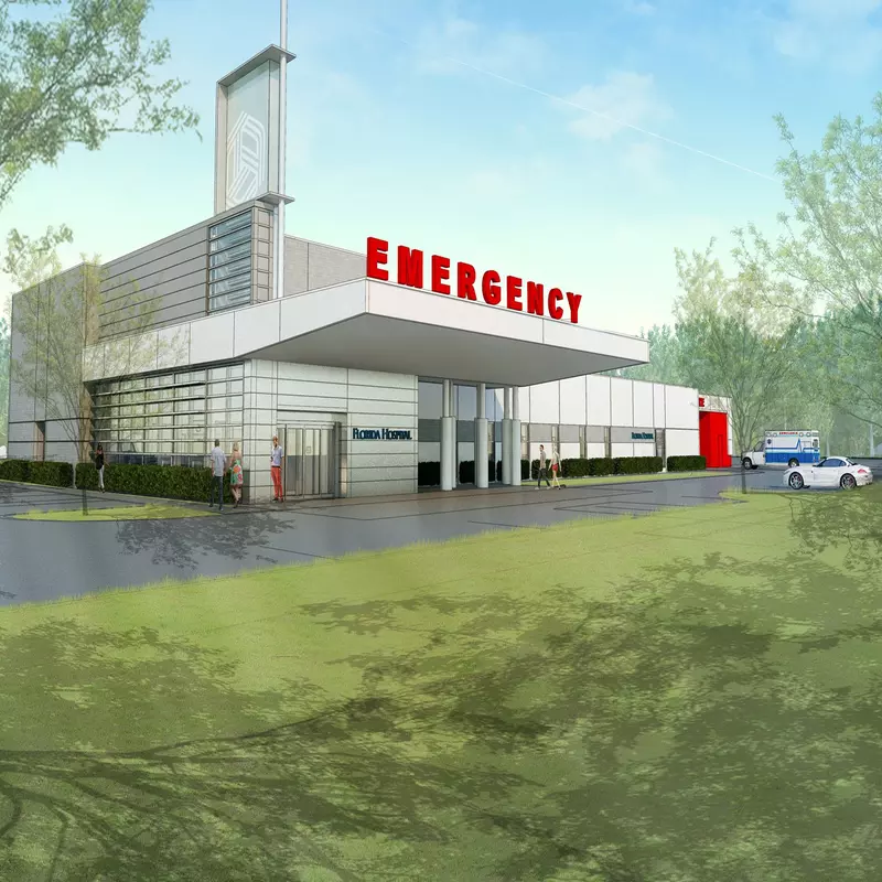 Digital rendering of the Deltona ER building mock up: a white building with the words Emergency on it surrounded by green space.