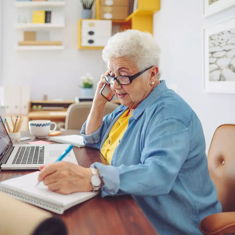 Elderly Woman working from home