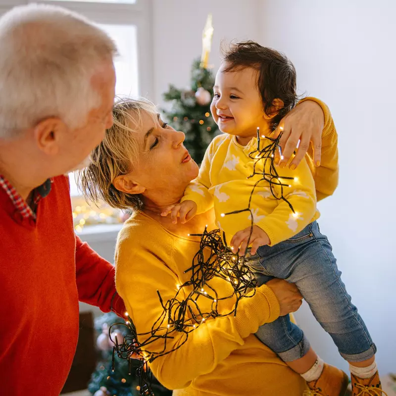 Trimming the tree with the family. 