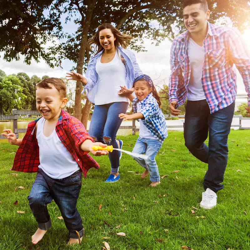 Happy family outdoors.