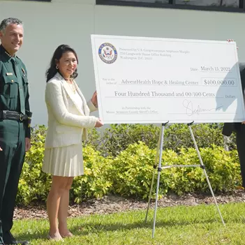 Sheriff Dennis Lemma, Rep. Stephanie Murphy and Tim Cook at Hope and Healing Center in Sanford