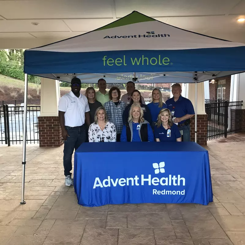 The team from AdventHealth Redmond proudly supports cancer screenings in the Rome-Floyd community. Pictured left to right in back are Terrence Hight, Lori Johnston, Michael Moody, Gerrice Raines, Brandon Lindley, Amanda Faulkenberry, Ashlee Charles, Marty Robinson  Table-Angie Terry, Sissy Charles and Tammy Jarrell.