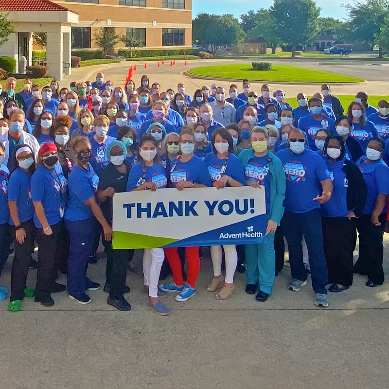 Annual Support Campaign Group with Thank You Banner Out Front of an AdventHealth Hospital