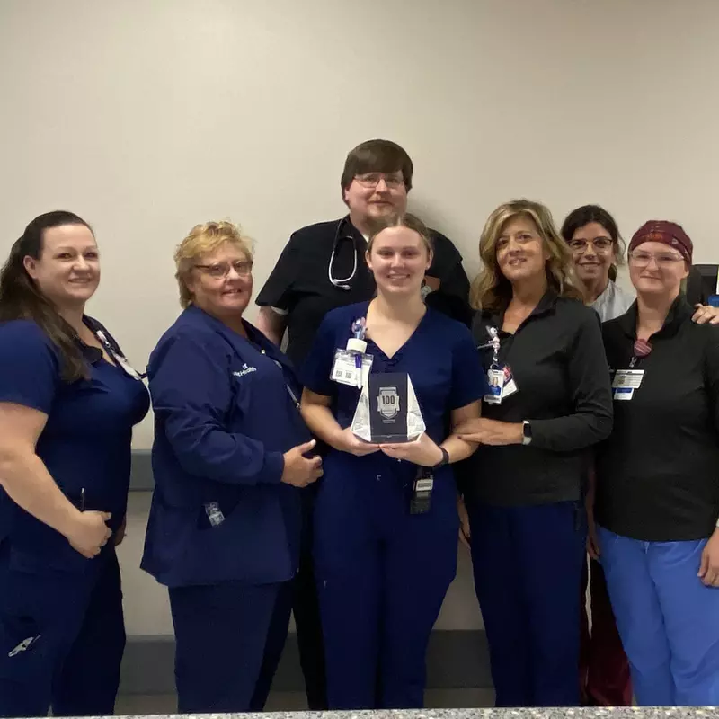 The emergency department team gathers to celebrate the 100 Top Hospital award. Left to right: April Springfield, RN, Pati Kelley, RN, Dax McKay, MD, Savannah Nix, RN, Tammy Bagley, RN, Yolanda Moyer, RN, and Rebecca Cline, PCT.