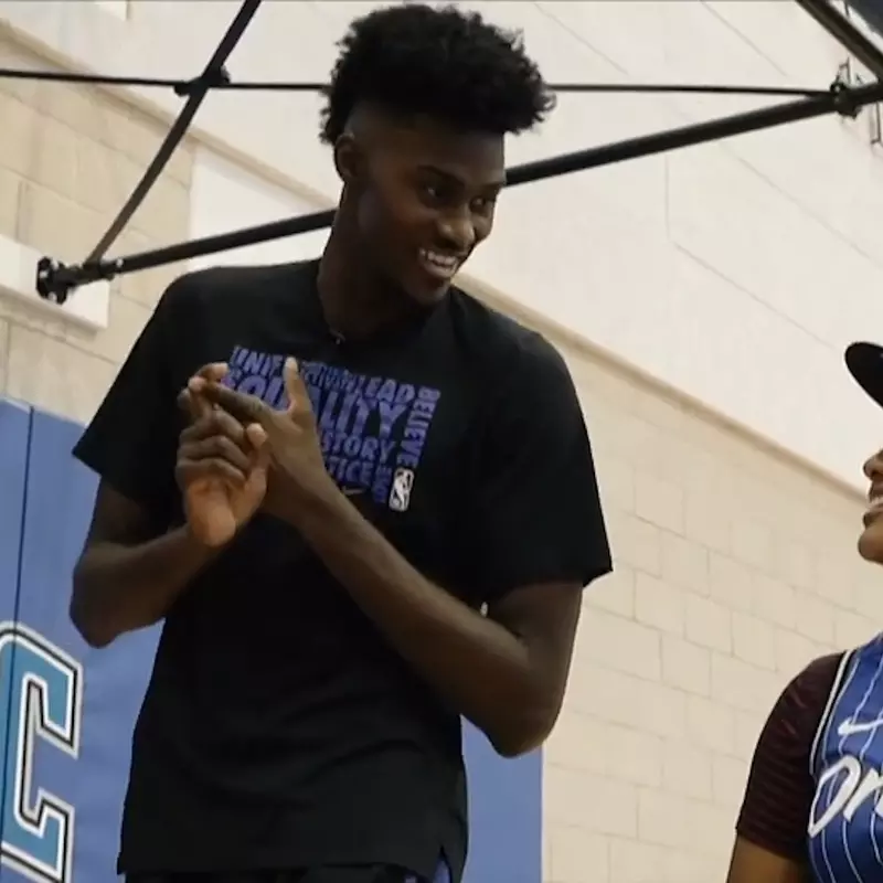 Jonathan Isaac of the Orlando Magic with a fan.