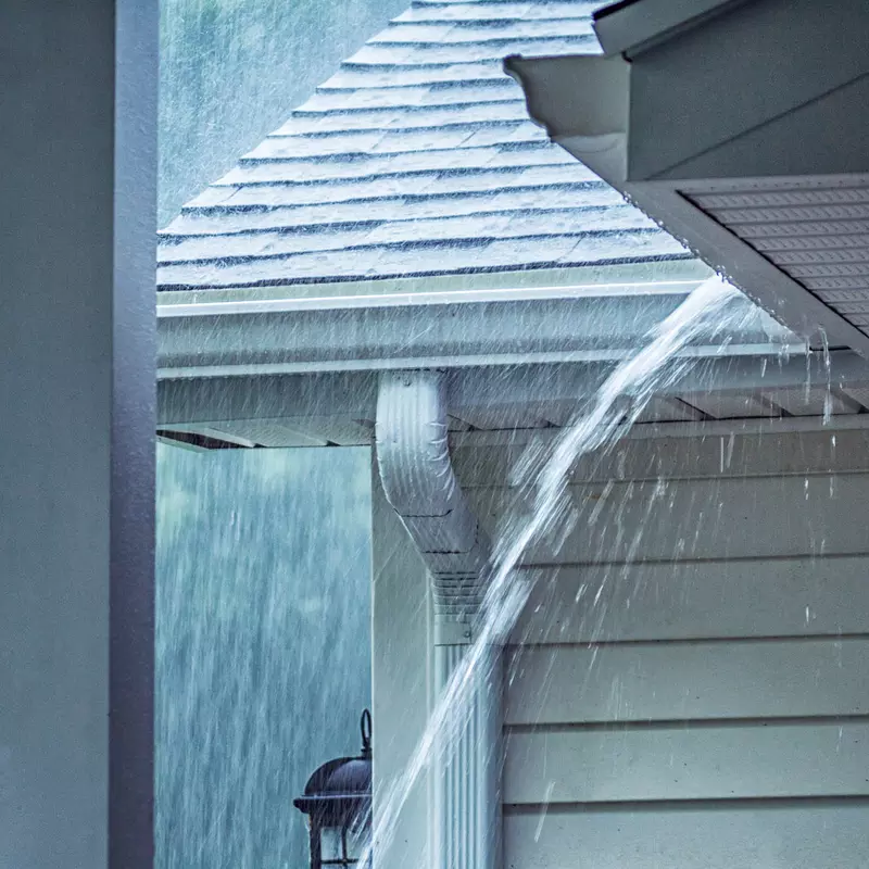 Heavy rainfall hits a home.