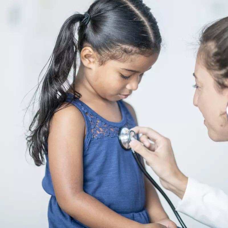 Little girl at doctor stethoscope