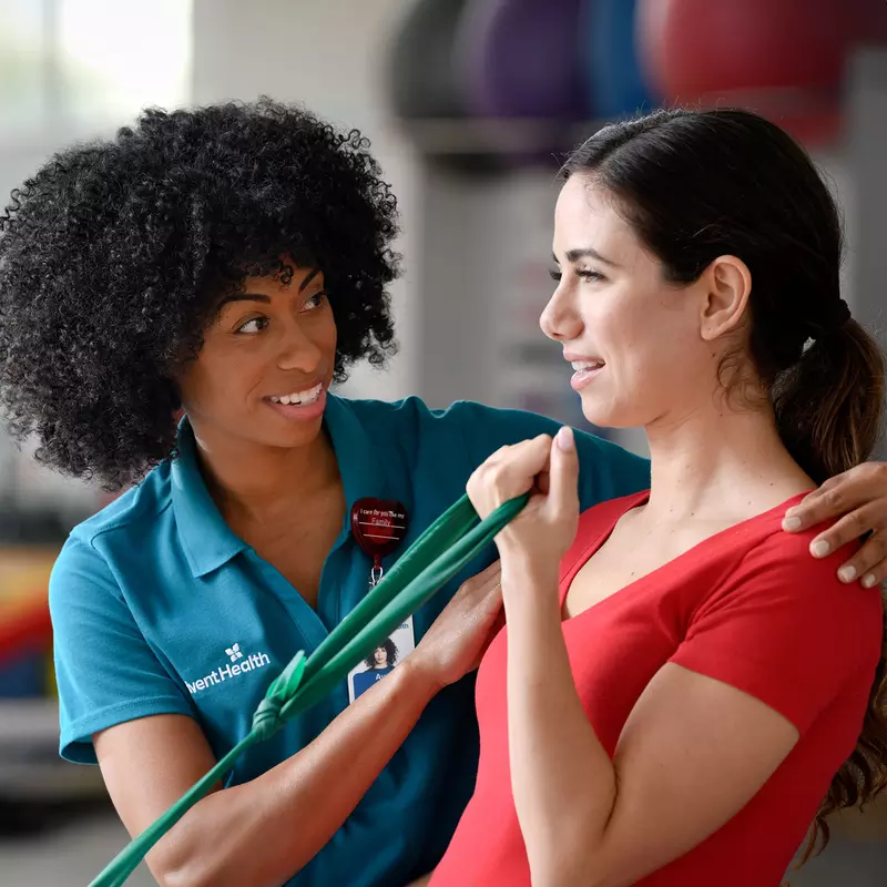A Therapist Helps a Patient Through a Orthopedic Physical Therapy Session.