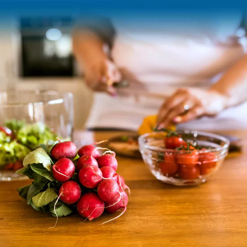 Woman chopping vegetables