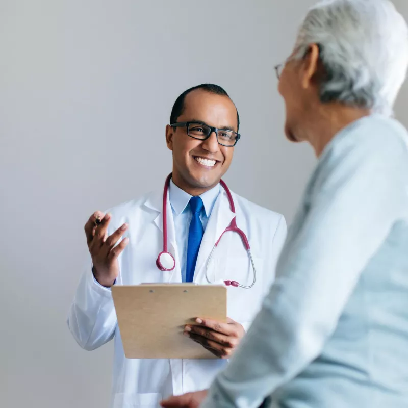 Doctor talking to patient