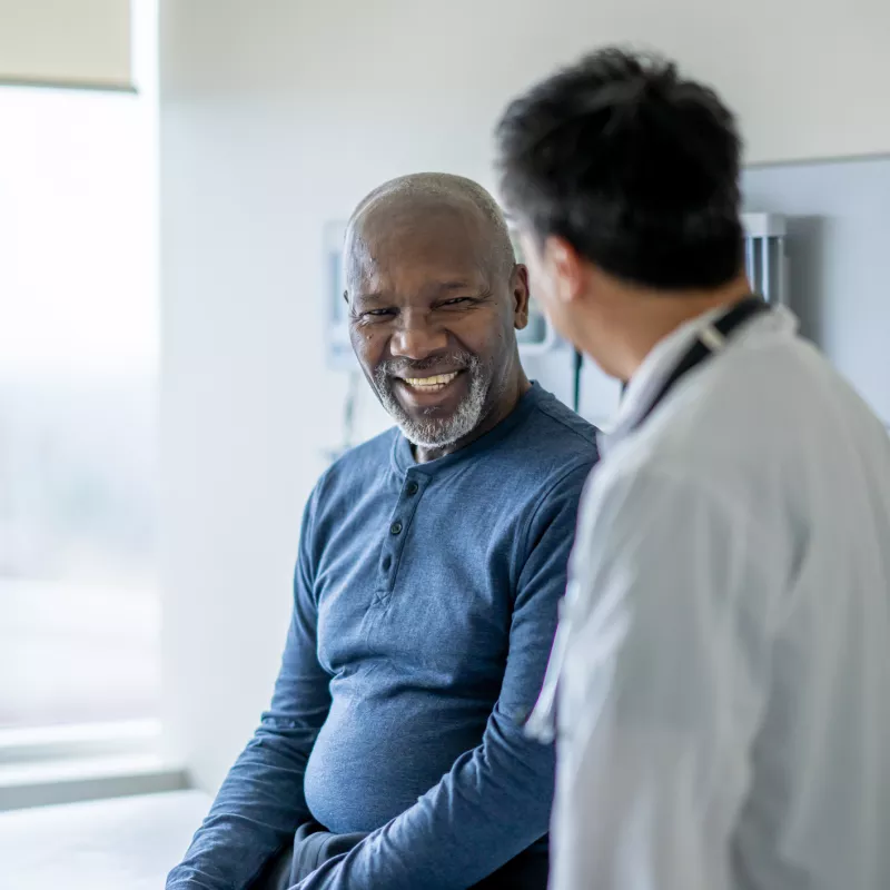 Man Talking to Doctor