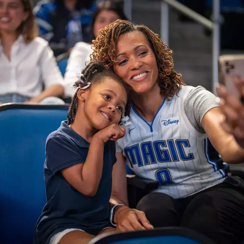 Orlando Magic Fan with Daughter at Game