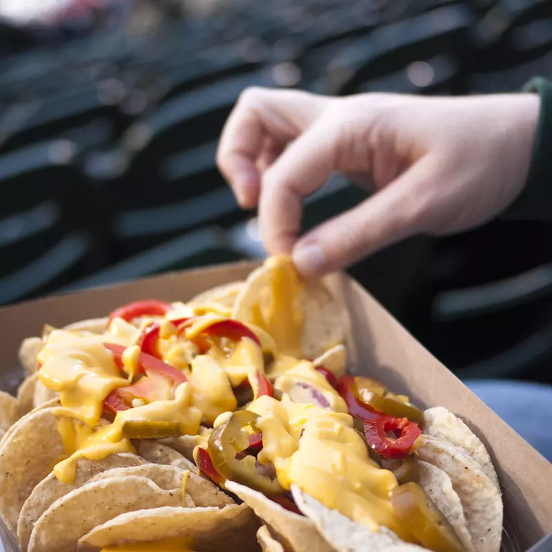 hand holding nachos