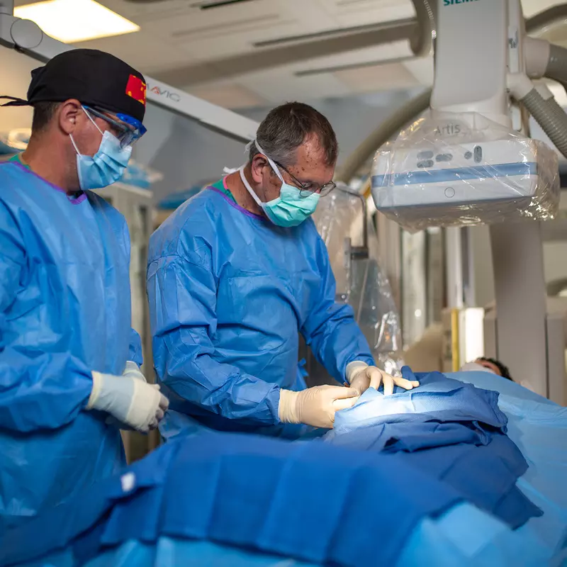 Neuro physicians performing Bi-plane procedure. 