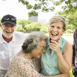 A group of happy senior citizens outdoors.