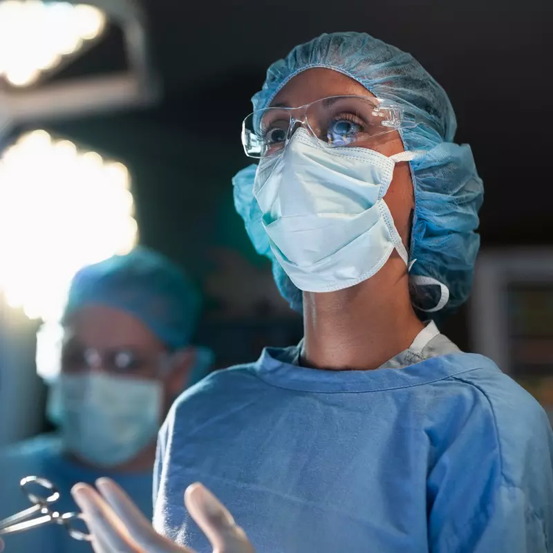 A woman surgeon in the operating room.