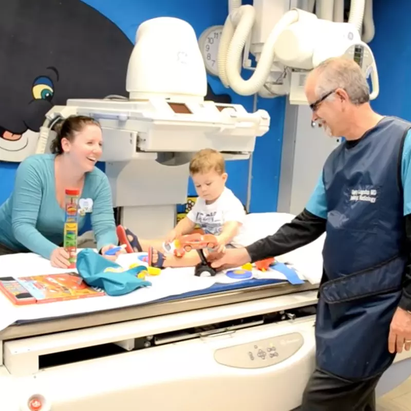 Pediatric Radiology/Imaging Patient with Two Providers Preparing to Take Some Imaging
