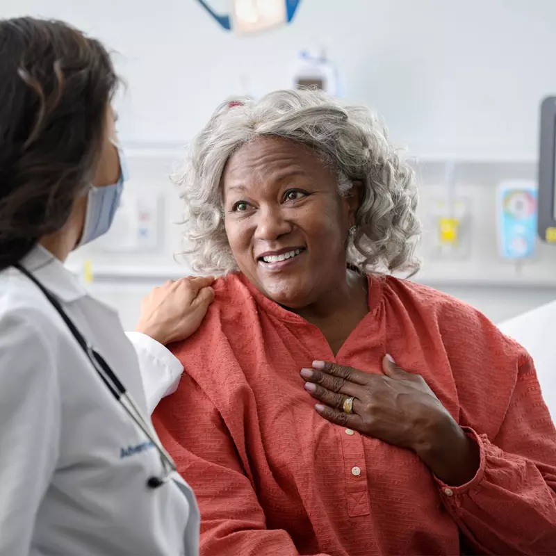 Older Woman Talking with Doctor