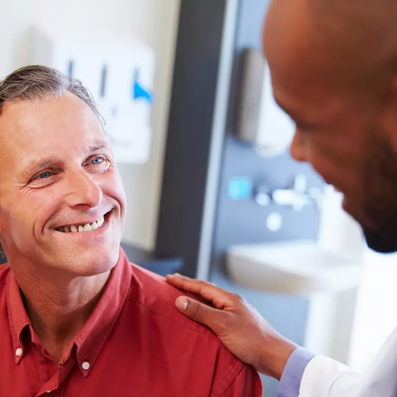 patient receiving a prostate cancer screening from a physician