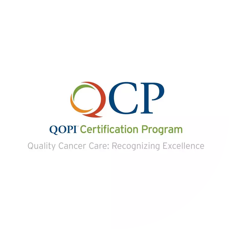 The logo for QOPI