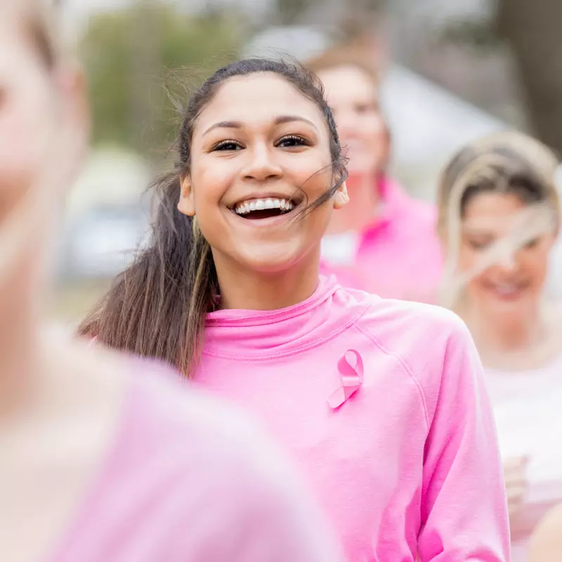 women in a breast cancer awareness run/walk