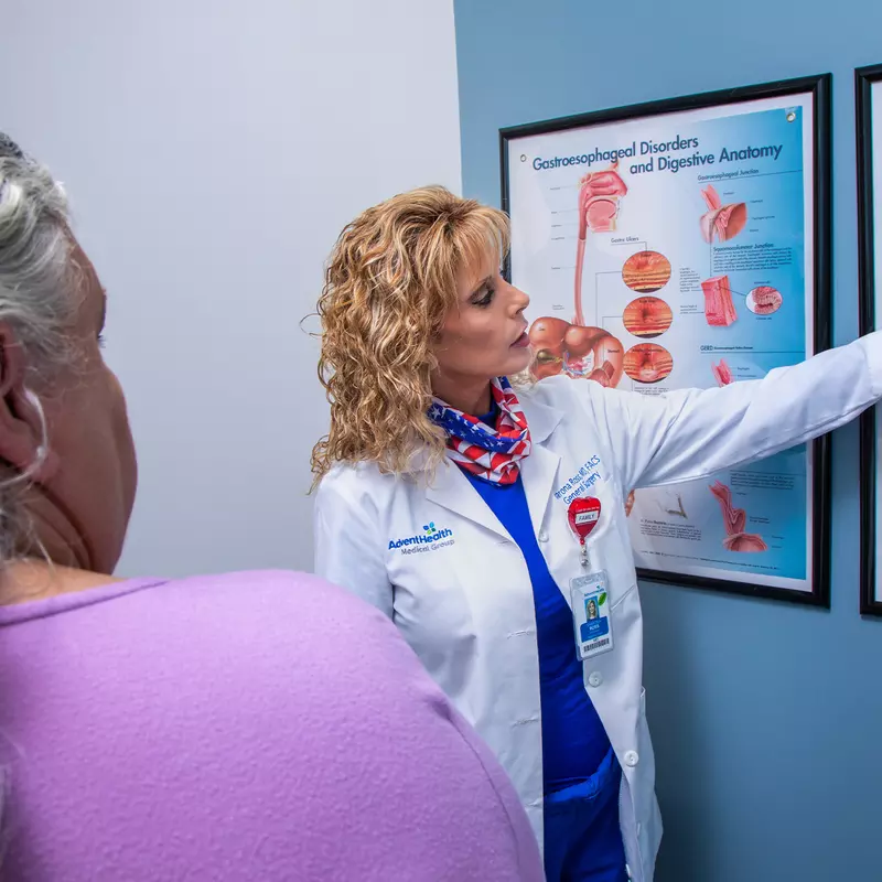 Sharona Ross showing patient diagram at an appointment at the AdventHealth Digestive Health Institute.