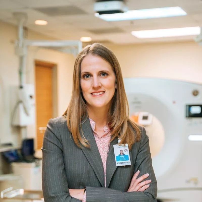 Woman in an MRI room