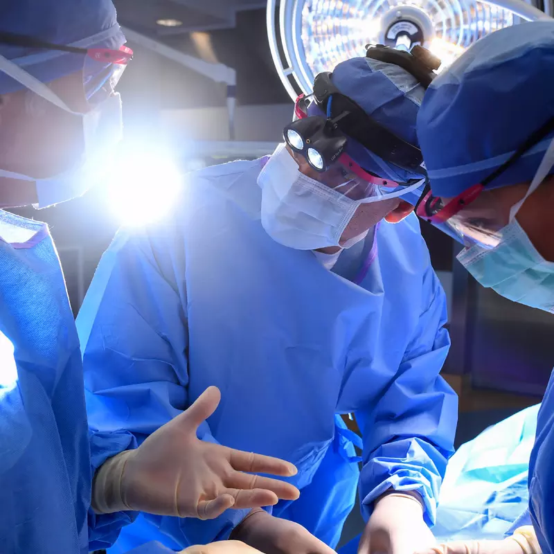 Surgeons discussing an operation