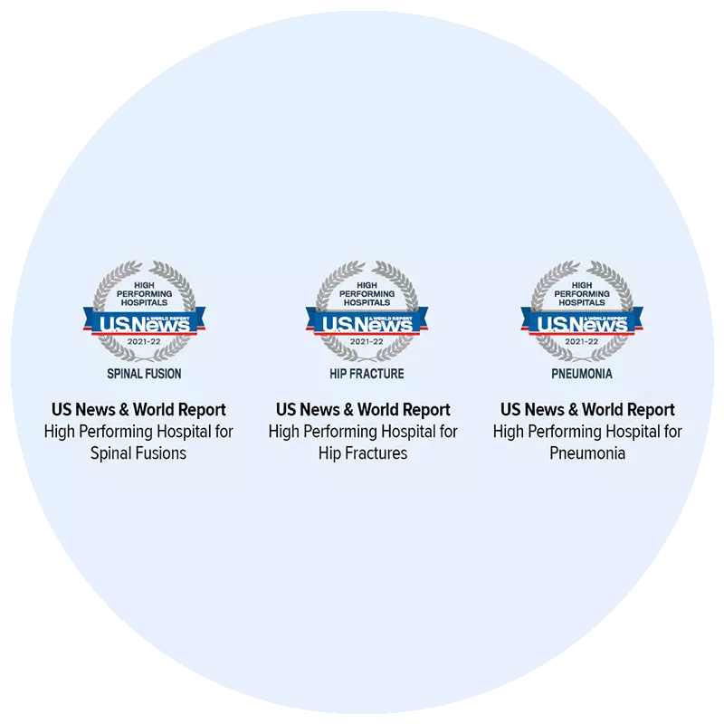 Three US News award logos within a circle