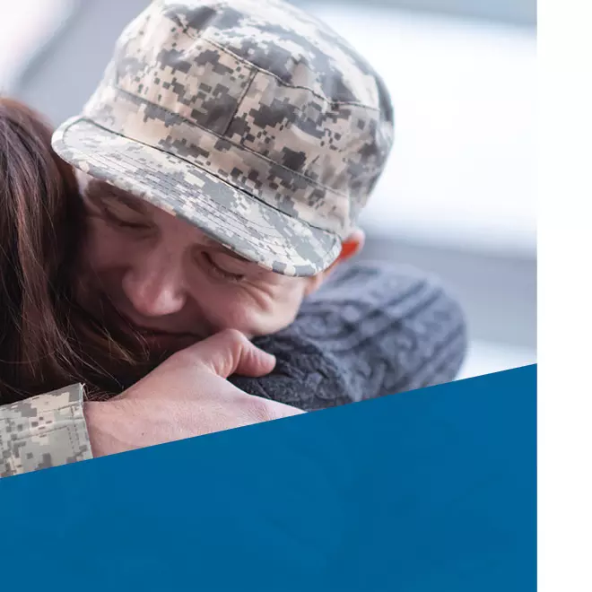 veterans day meal soldier hugging loved one
