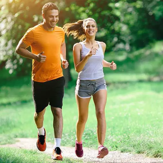 A man and a woman jogging