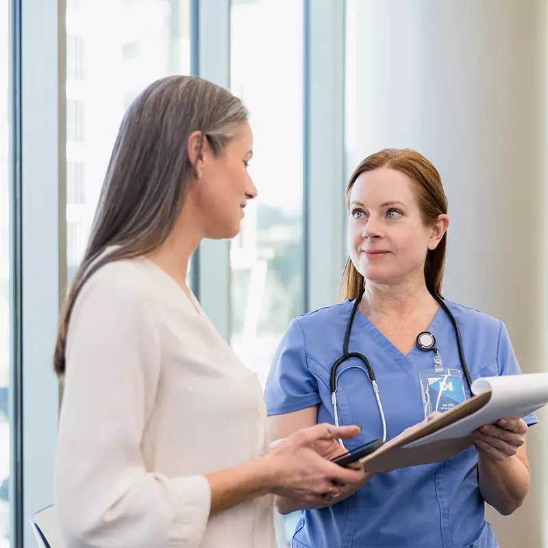 Women's primary care patient meeting with provider