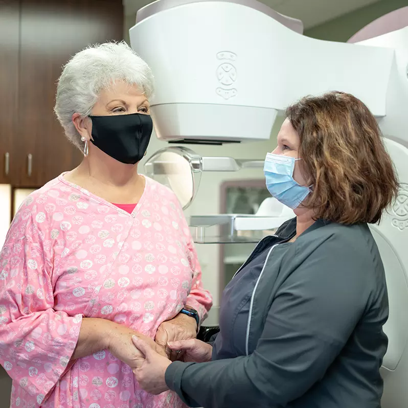 Linda Hauff getting ready for Mammogram with nurse