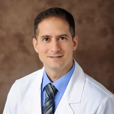 Photo of Enrique E. Vega, MD, FACS, FAAFP