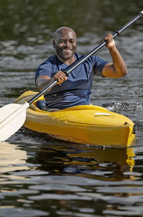 A man kayaking.