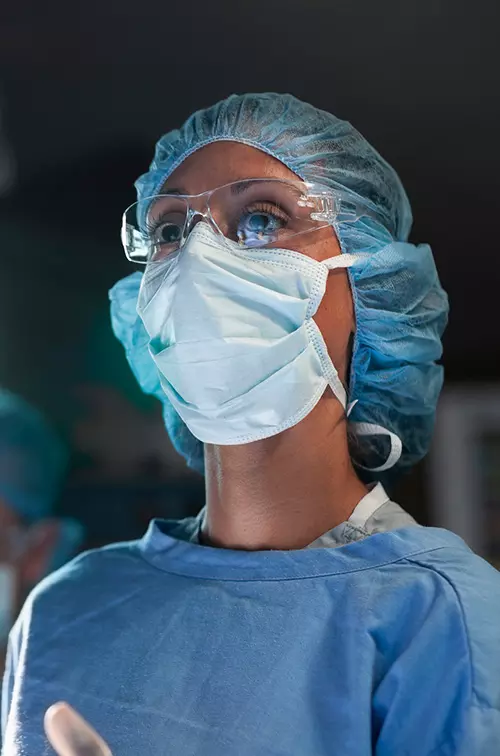 A woman surgeon in the operating room.
