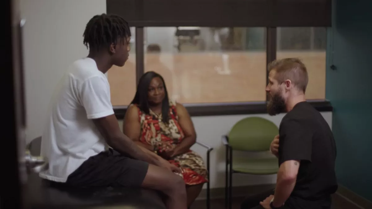 Antonio Parker and his mother, during an office visit with Dr. Sean Keyes.