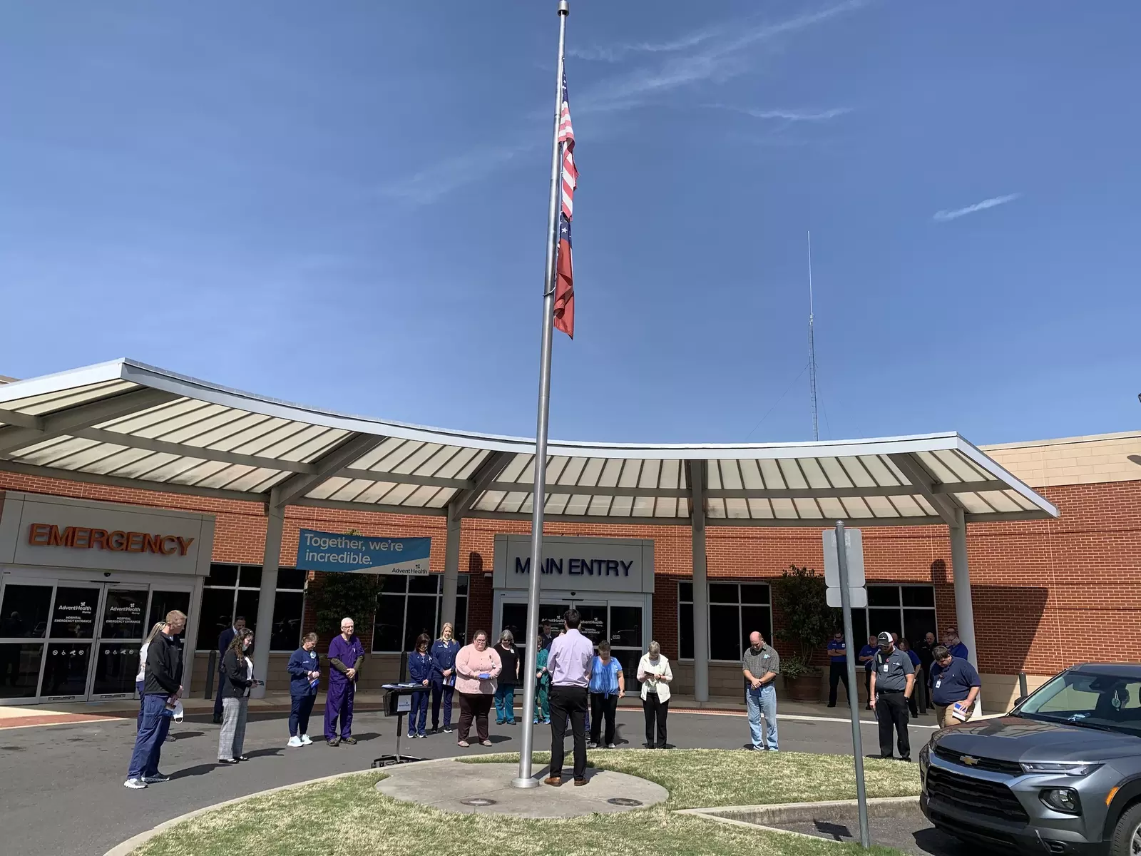 AdventHealth Murray gathers at the flagpole with the community for a moment of prayer.