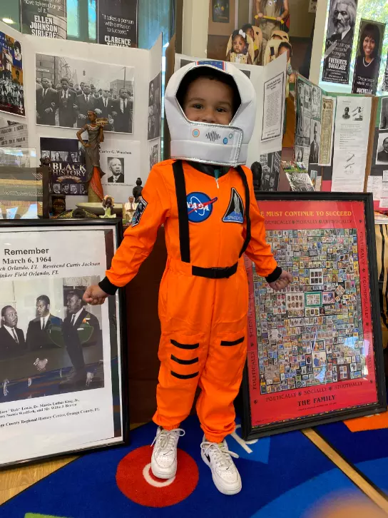 A student at AdventHealth for Children's West Lakes ELC dresses as an astronaut for Black History Month.
