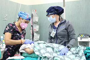 the sharing smiles medical team performing a procedure