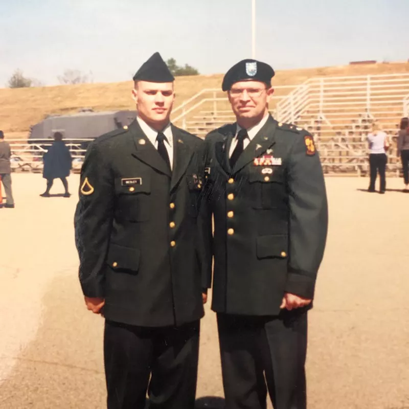 Wesley with his father at bootcamp graduation in Ft. Benning, GA, now called Ft. Moore, in March 2002.