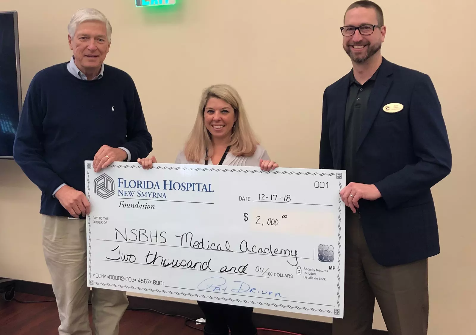 Pictured from left to right: Pat Driver, AdventHealth New Smyrna Beach Foundation chair, Lindsay Posick, New Smyrna Beach High School Medical Academy, and Julian Doster, New Smyrna Beach High School assistant principal. 
