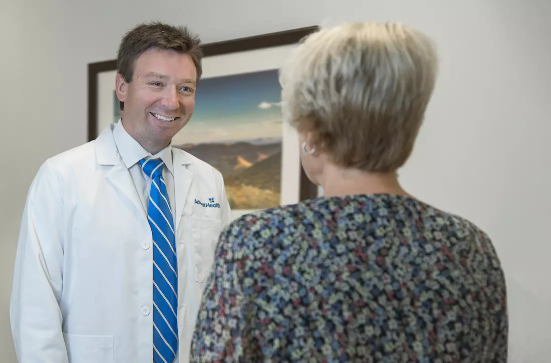 Dr. Andrew McCue with Patient
