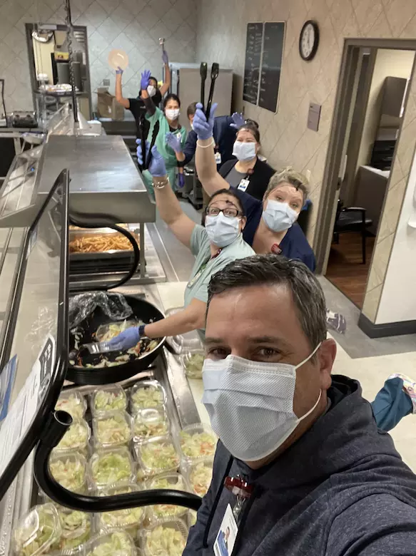 AdventHealth hospital CEOs helped prepare meals for hospital staff at a time when the cafeteria needed extra support.
